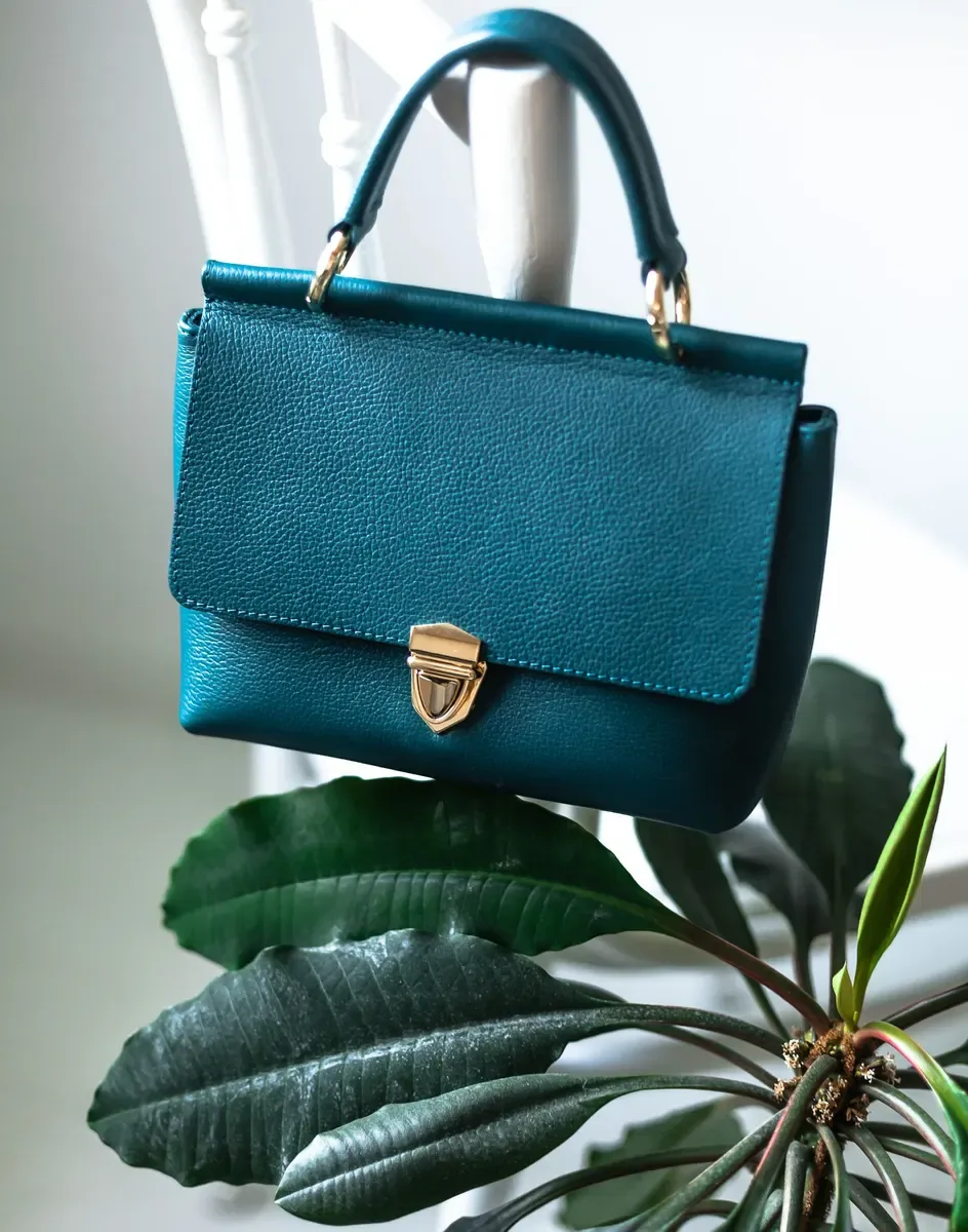 Leather handbag with gold clasp, photo 1 of 3 (sample photo)