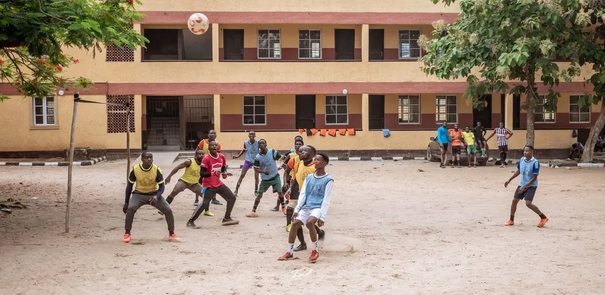 Pupils in the school compound (sample photo)
