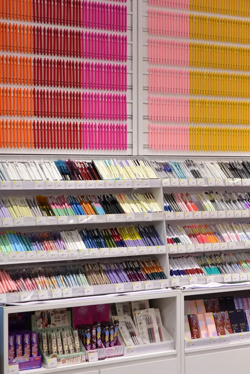 Notebooks, pens and pencils on display (sample photo)